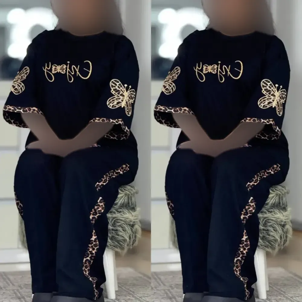 ست تیشرت و شلوار زنانه طرح enjoy جنس اسپان گلکسی رنگ مشکی سایز فری 38 تا 46